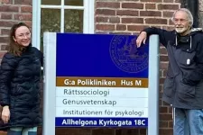 Ekaterina Zmyvalova and Senior Professor Per Wickenberg outside the Sociology of Law Department at Lund University.